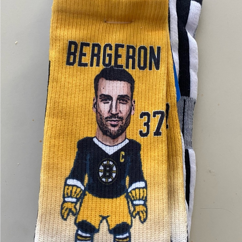 Boston Bruins team captain Patrice Bergeron athletic socks